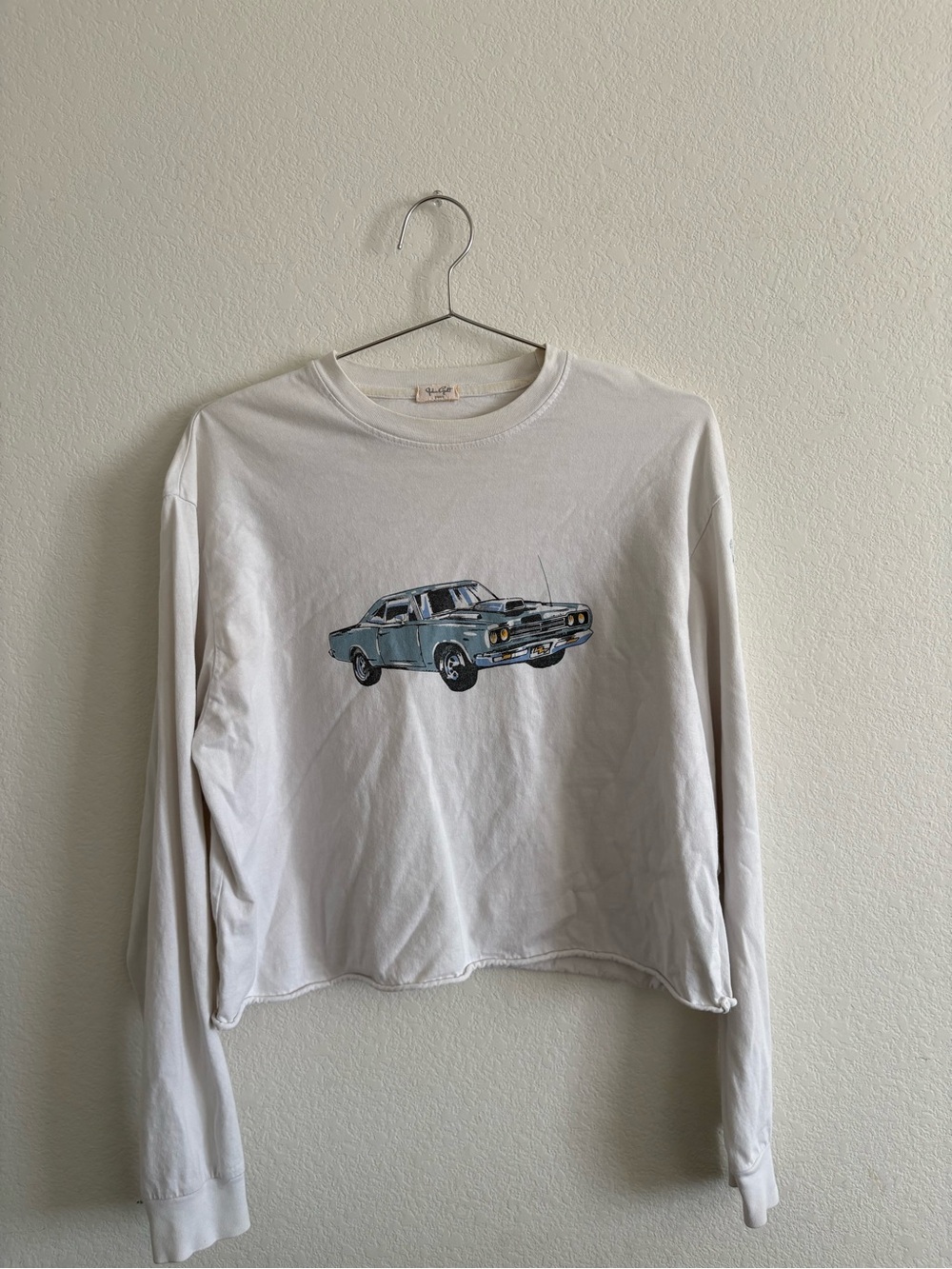 Brandy Melville White Long-Sleeve Tee with Light Blue Car Graphic